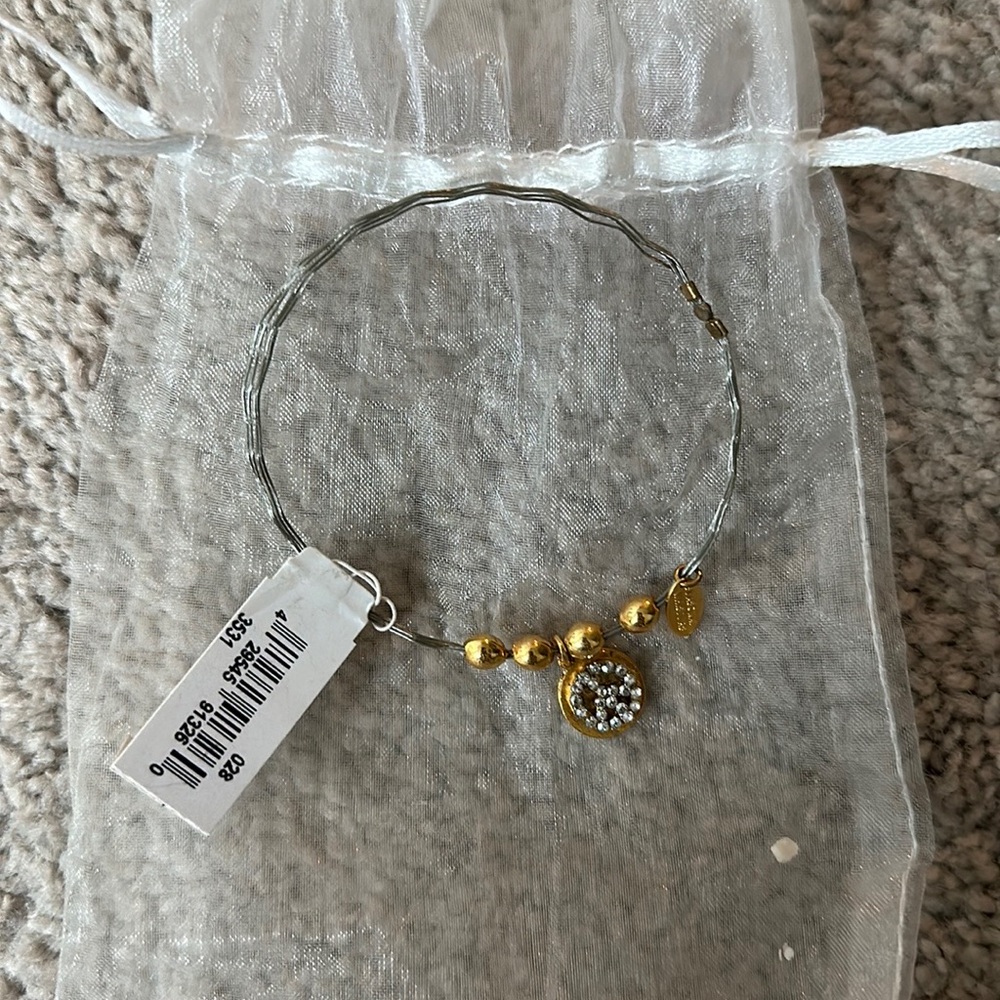 Seasonal Whispers Swarovsky PEACE Bracelet Bangle